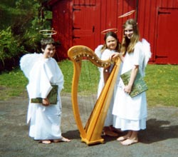 harp students ready for a performance dressed as angels